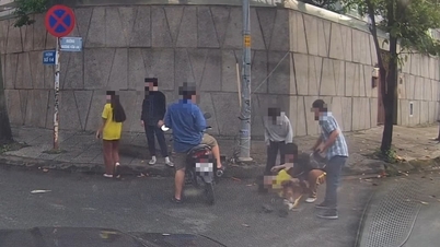 हो ची मिन्ह सिटी में छात्रों के दो समूहों के बीच सड़क पर हुई लड़ाई की पुष्टि करने वाली क्लिप, एक छात्र को तब तक पीटा गया जब तक उसे दौरा नहीं पड़ गया