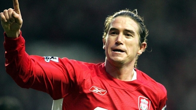 Why is the new head coach of Hanoi called 'lucky god' at Liverpool?