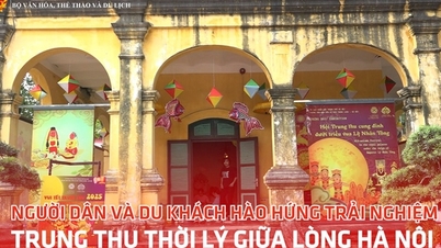 Menschen und Touristen freuen sich darauf, das Mittherbstfest der Ly-Dynastie im Herzen von Hanoi zu erleben
