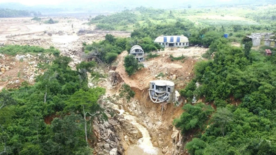 [صورة] لام دونج: صورة مقربة لبحيرة غير قانونية ذات جدار مكسور