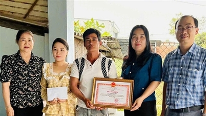 Hyller mannen som hoppet i elven og reddet livet til en kvinne i La Gi