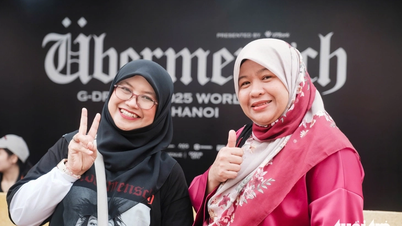 Internationella fans följer G-DRAGON i Hanoi, passar på att äta pho och bröd och dricka iskallt kaffe
