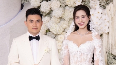 الآنسة دو ثي ها "مطلية بالماس" بجانب العريس، كان حفل الزفاف مثل بحر من الزهور البيضاء