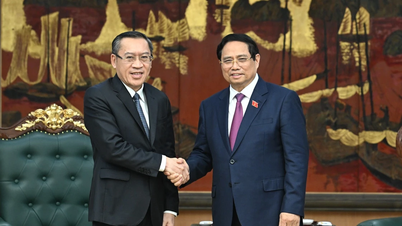 [Photo] Prime Minister Pham Minh Chinh receives Lao Minister of Labor and Welfare Phosay Sayasone