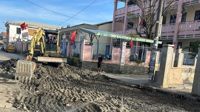 An Thang Ward ជួសជុលផ្លូវ DH15 ដែលខូចខាតបន្ទាប់ពីទឹកជំនន់