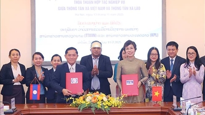 VNA:s generaldirektör Vu Viet Trang för samtal med generaldirektören för nyhetsbyrån Pathet Lao