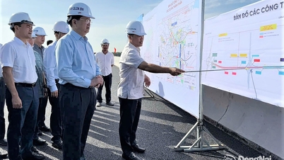 Ved å benytte seg av det gode været, fullførte byggearbeidene dag og natt den tekniske trafikkåpningen av Ringvei 3 - Ho Chi Minh-byen.