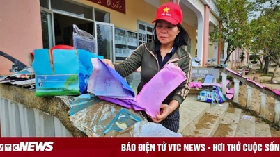 The school was devastated after the historic flood, books were covered in mud.