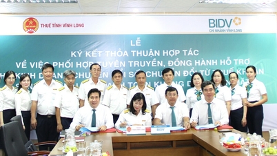 Signature d'un accord de coopération entre les succursales des services fiscaux provinciaux et de la BIDV à Vinh Long, Ben Tre et Tra Vinh