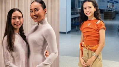 Φορώντας ao dai με τη μητέρα της, η 11χρονη κόρη της, Doan Trang, προκάλεσε σάλο με τη σιλουέτα της σαν νεαρό κορίτσι.