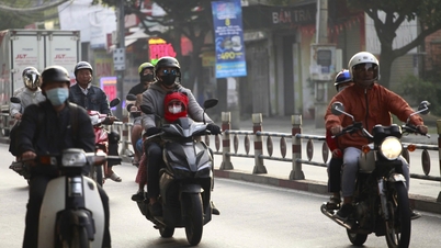 [فوٹو سیریز] ٹھنڈی ہوا واپس آتی ہے، بہت سے لوگ صبح سویرے باہر جانے کے لیے گرم کپڑے پہنتے ہیں۔