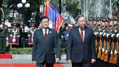 Ceremonia solemne de bienvenida oficial al Secretario General To Lam en su visita de Estado a Laos