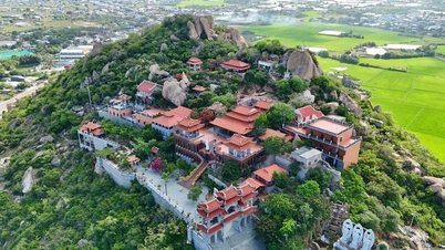 Trung Son Ancient Temple: A temple with its back against the mountain and a sea view
