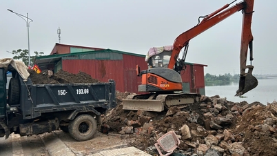 किएन हाई कम्यून ने सांग नदी के तट से अवैध अतिक्रमण हटाया और उसे समतल किया