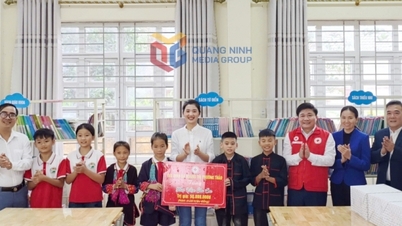 Spende einer Bibliothek an Kinder der Gemeindeschule Quang Duc