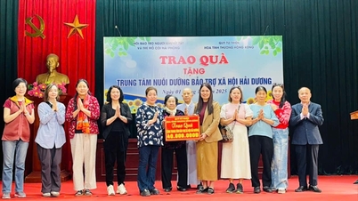 Å gi gaver til funksjonshemmede og foreldreløse barn i Hai Phong og Hung Yen