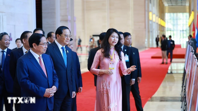 वीएनए फोटो प्रदर्शनी वियतनाम-लाओस रणनीतिक सहयोग की गहराई का सम्मान करती है