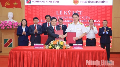 พิธีลงนามข้อตกลงความร่วมมือระหว่างสาขาธนาคาร Agribank และกรมสรรพากรจังหวัดนิญบิ่ญ