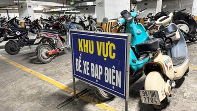 ຕຶກອາພາດເມັນອີກແຫ່ງໜຶ່ງຢູ່ຮ່າໂນ້ຍ ຫ້າມບໍ່ໃຫ້ປະຊາຊົນຈອດລົດໄຟຟ້າຢູ່ໃນຊັ້ນໃຕ້ດິນ.