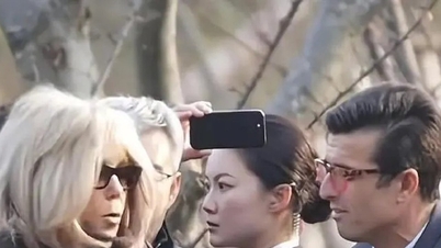 Самая красивая женщина-телохранительница Китая привлекает внимание, охраняя первую леди Франции.