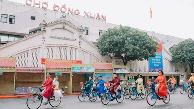 به جشنواره طراحی در بازار دونگ ژوان و ساحل شنی وسط رودخانه سرخ بروید.