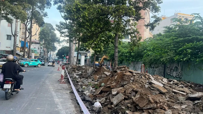 A cidade de Ho Chi Minh expande a rua Tran Binh Trong, bairro Vuon Lai.