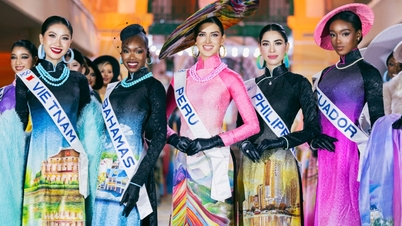 73 מלכות יופי בינלאומיות הציגו את קולקציית Ao Dai "מורשת במורשת" של המעצב טרונג דין.