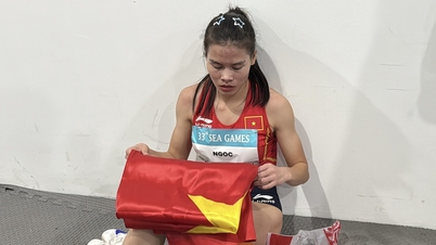 Imej menyentuh hati juara Sukan SEA yang keletihan tetapi masih menghargai bendera kebangsaan.