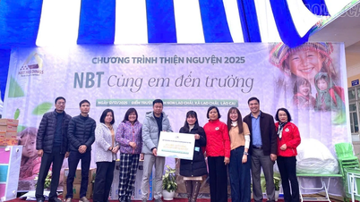 ラオチャイコミューンの学校食堂の開設と学生への贈り物の贈呈。