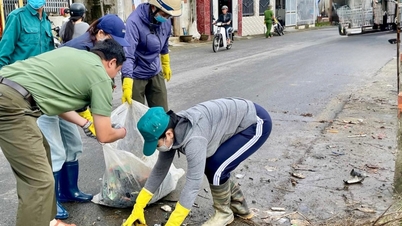 ตำบลฮวาธิญเปิดตัวโครงการรณรงค์ทำความสะอาดสิ่งแวดล้อมพร้อมกันหลังจากเกิดอุทกภัย