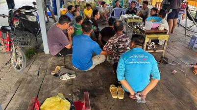 Authorities raided a gambling den, detaining 19 people.