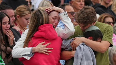 Images show people in Australia commemorating the victims of the shooting.