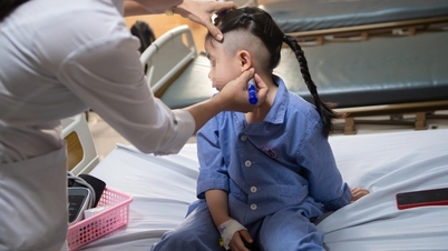 Watch with bated breath as doctors implant a hearing aid for a deaf baby.