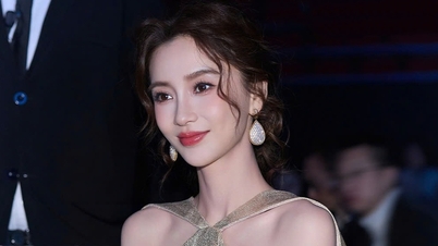 Frumusețea lui Angelababy pe covorul roșu la doi ani după ce a fost trecută pe lista neagră pentru că a vizionat un spectacol de striptease.