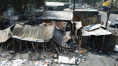 Small traders are stunned after the fire at Thanh Da market in Ho Chi Minh City.