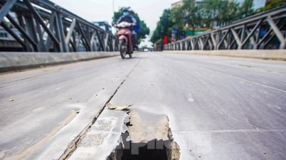 ស្ពាន​បាក់​ច្រែះ​នៅ​ក្រុង​ហាណូយ