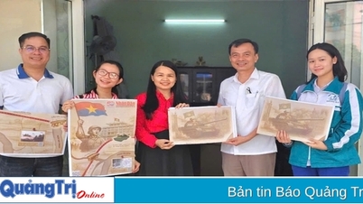 Regalamos casi 2.000 suplementos especiales del periódico Nhan Dan a los lectores de Quang Tri