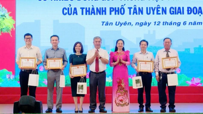 Tan Uyen City trifft sich mit religiösen Würdenträgern und typischen Unternehmen