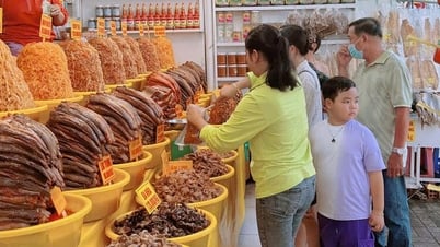 Marché de la sauce de poisson - une particularité de la région frontalière