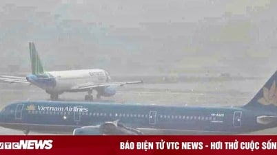 Sân bay Nội Bài 'tê liệt' vì mưa dông