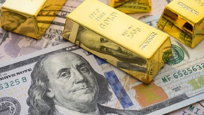Giá vàng giảm mạnh, USD vẫn 'căng'
