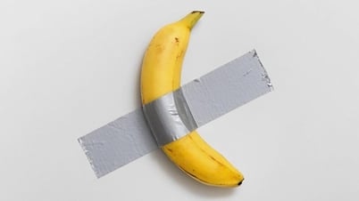 Maurizio Cattelan says his 'banana on the wall' is an artistic provocation