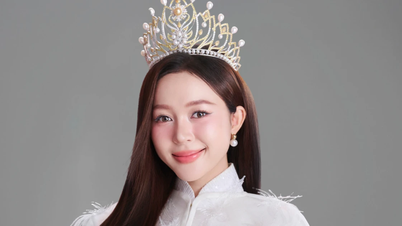 Kiều Duy hưởng ứng tinh thần 2/9 với áo dài trắng trên trang chủ Miss International