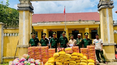 Giving gifts to people of Se Sap village, Laos