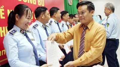 Transfert des décisions du personnel du Département de gestion du marché de la province d'An Giang