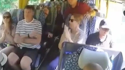 Westerse toeristen prezen de chauffeur voor zijn spectaculaire remmanoeuvre in Tuyen Quang.