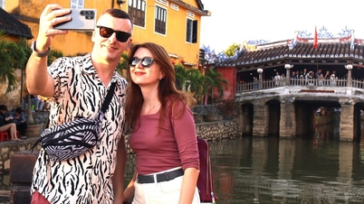 Tourists inch their way through Hoi An's old town on New Year's Day.