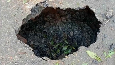 Auf einer Nationalstraße in der Provinz Quang Tri ist ein 3 Meter tiefes Erdloch entstanden.