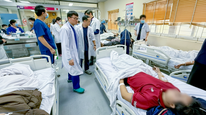 Femten personer er innlagt på sykehus etter brann på et pensjonat i Hanoi tidlig om morgenen.
