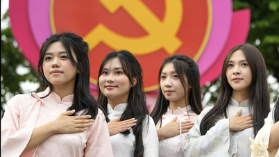 Young people check in at the space welcoming the 14th National Congress of the Communist Party of Vietnam in Hanoi.